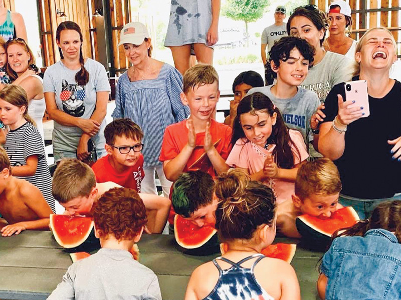 Watermelon eating contest at The Arena