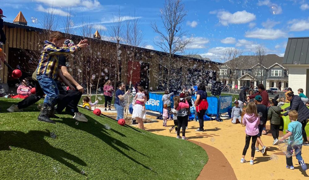kids playing with bubbles